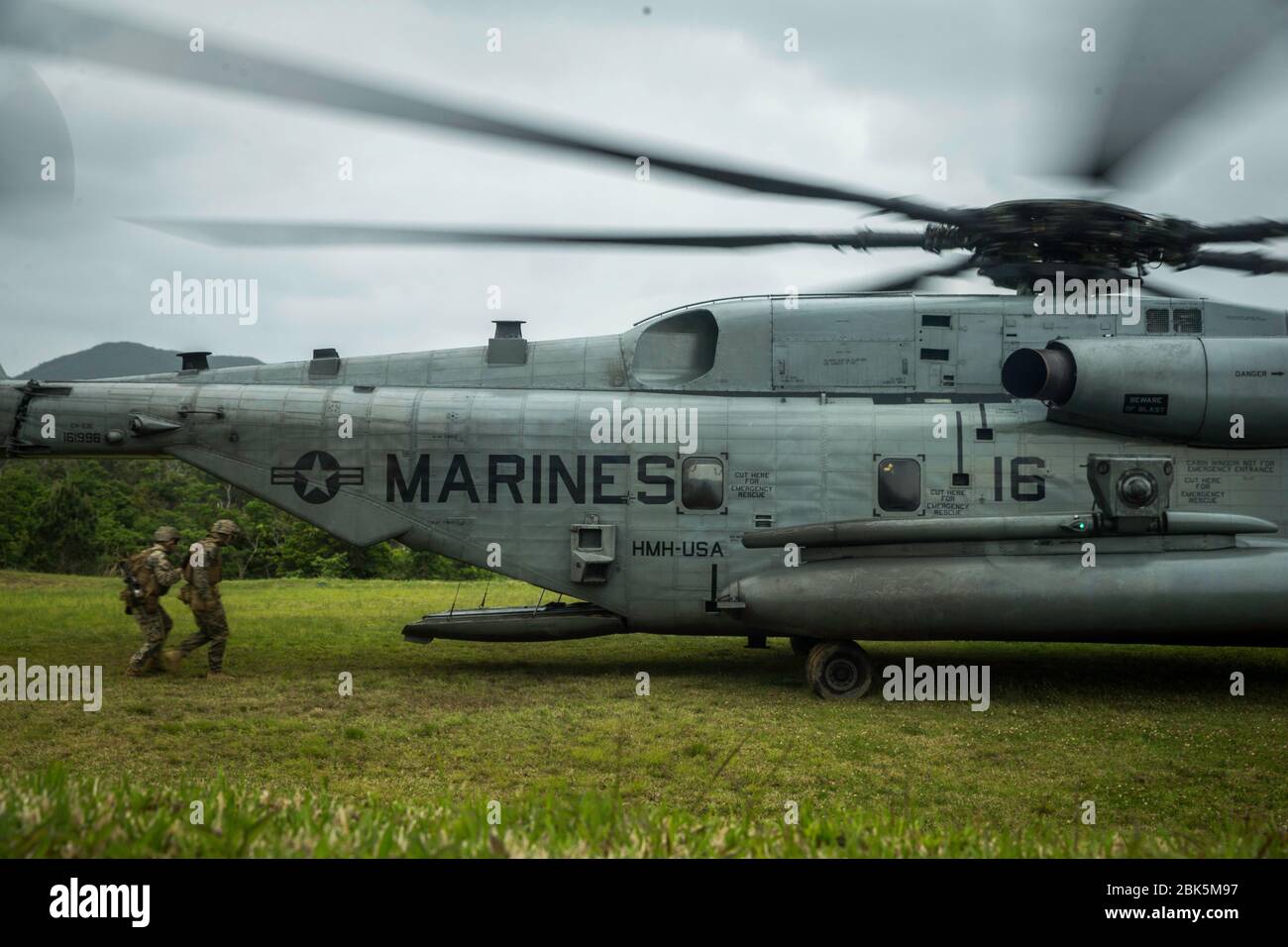 U.S. Marines with Company B, 3rd Light Armored Reconnaissance Battalion, currently assigned to 3rd Marine Division, board a CH-53 from Marine Heavy Helicopter Squadron 466 on Okinawa, Japan, April 22, 2020. The Marines were participating in casualty evacuation drills.  CASEVACS are used to quickly extract patients who are in need of critical medical attention. (U.S. Marine Corps photo by Cpl. Savannah Mesimer) Stock Photo