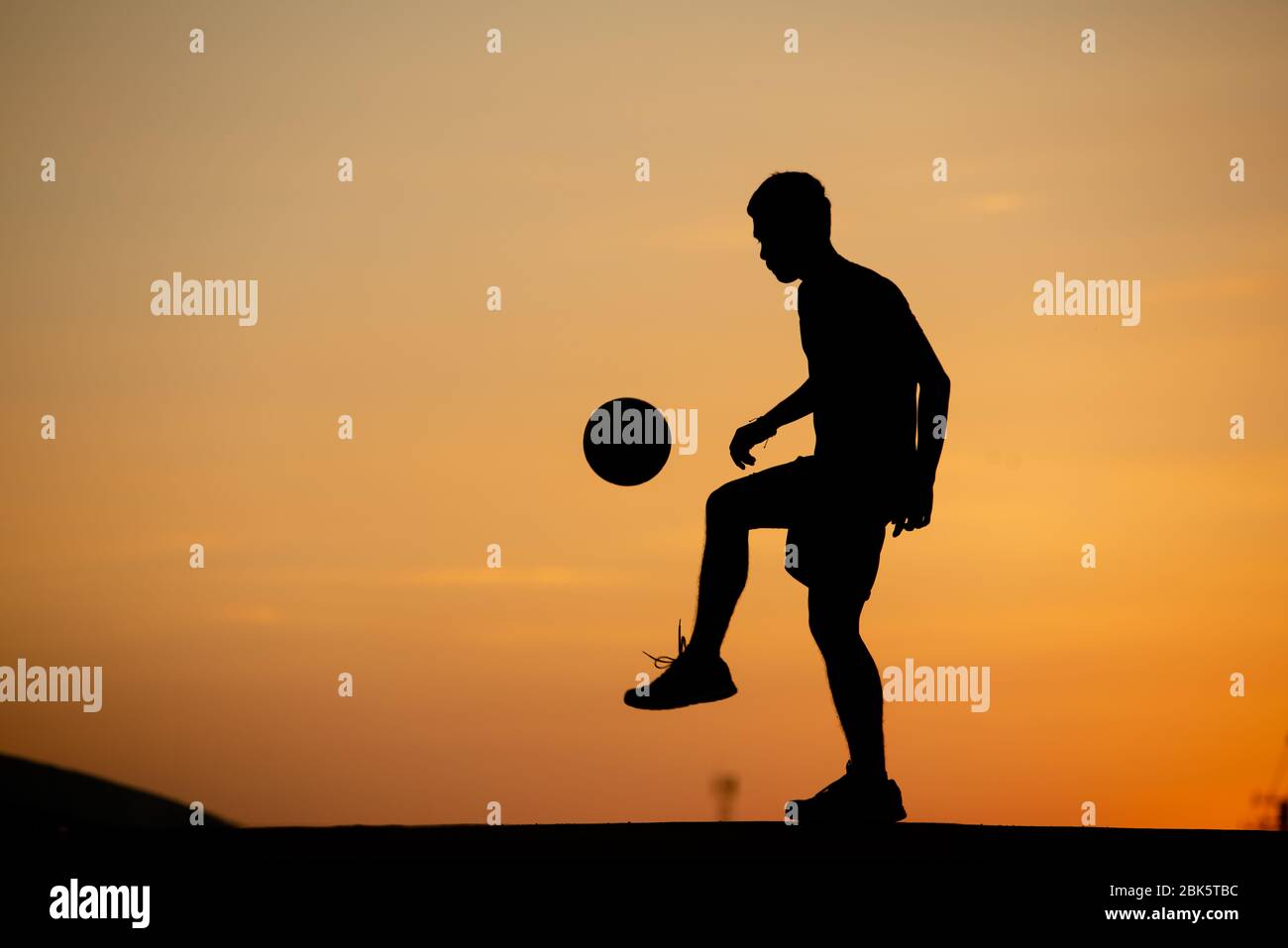 Page 3 Boy Playing Football Sunset Silhouette High Resolution Stock Photography And Images Alamy