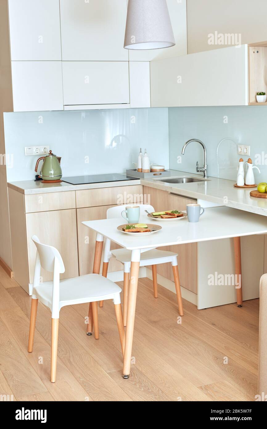 Light empty modern kitchen interior at day time Stock Photo - Alamy