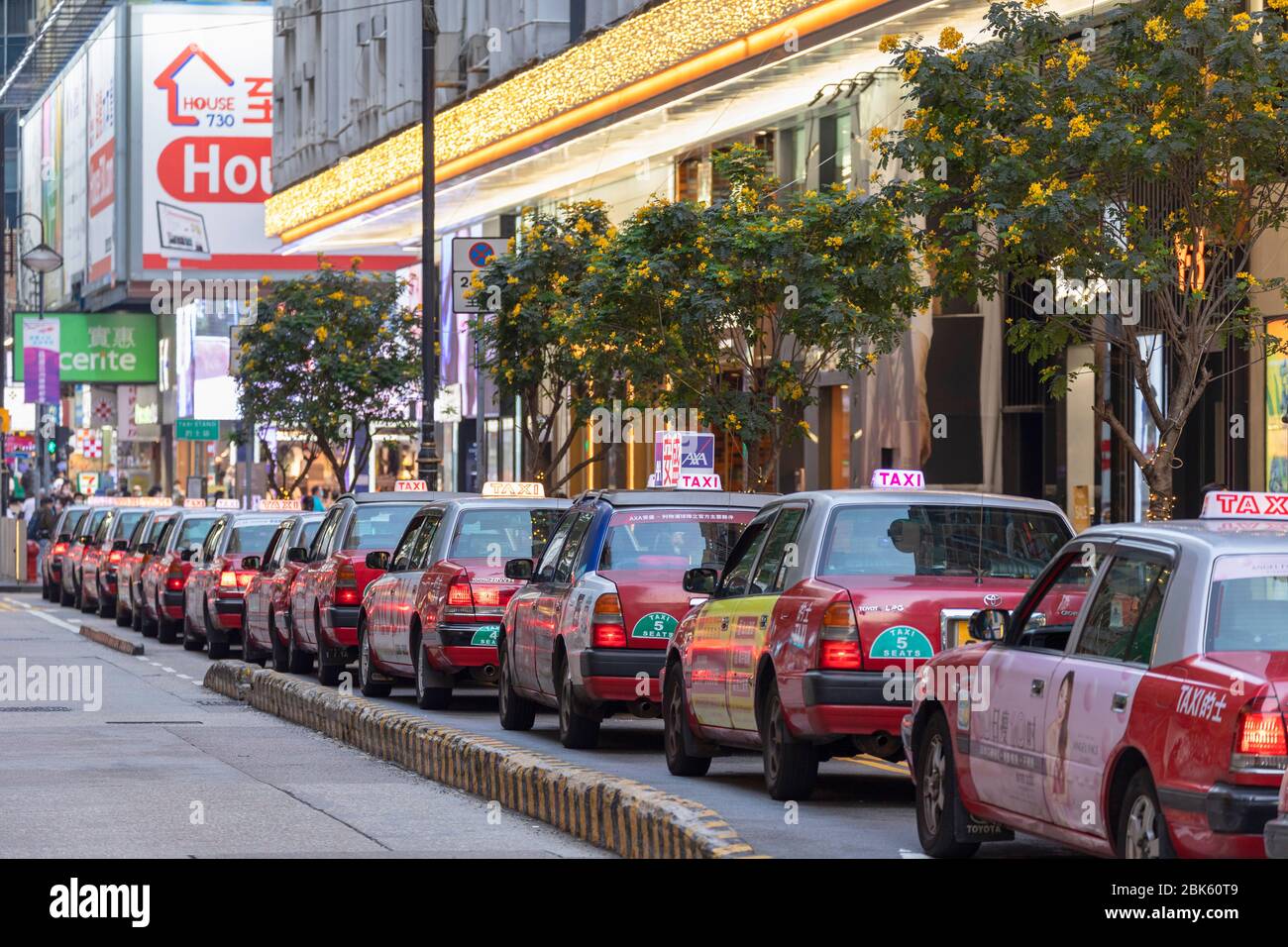 Taxis in queue, Causeway Bay, Hong Kong Stock Photo