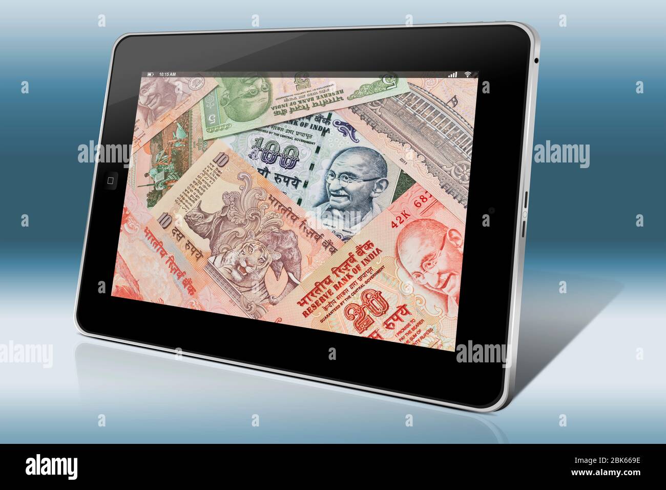Many Indian rupees bills with the portrait of Mahatma Gandhi lying side by side, India, Asia Stock Photo