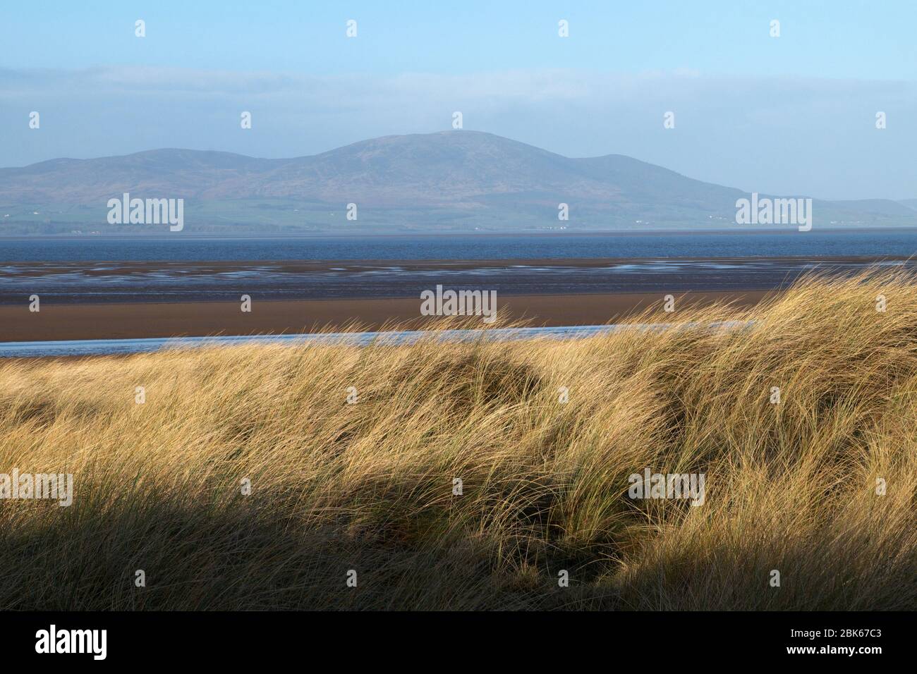 From dunes near Silloth, Cumbria, looking across the Solway Firth to Criffel in Dumfries & Galloway Stock Photo