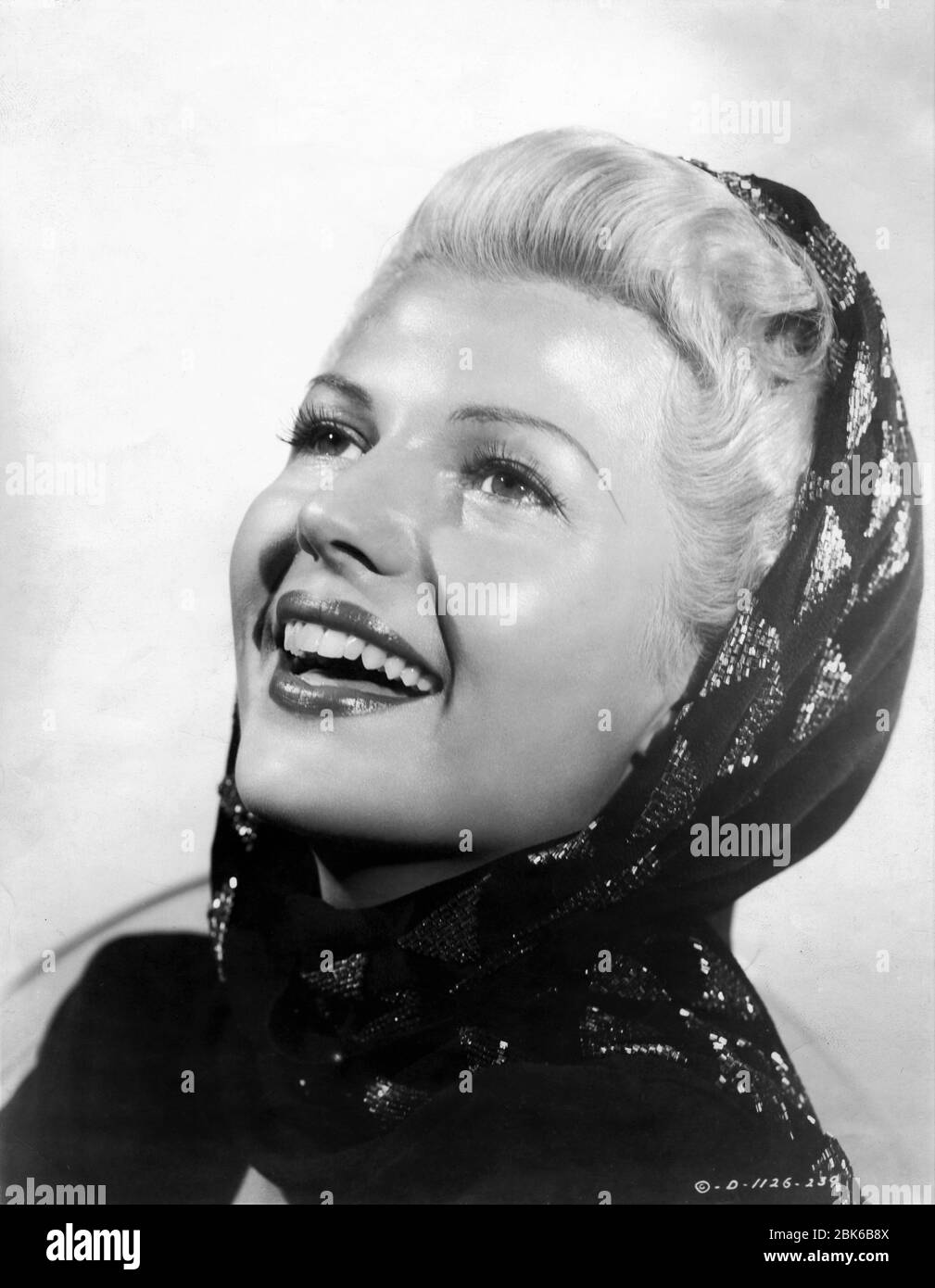 RITA HAYWORTH Portrait as Elsa Bannister in THE LADY FROM SHANGHAI 1947 director / screenplay ORSON WELLES based on novel by Sherwood King gowns Jean Louis Columbia Pictures Stock Photo