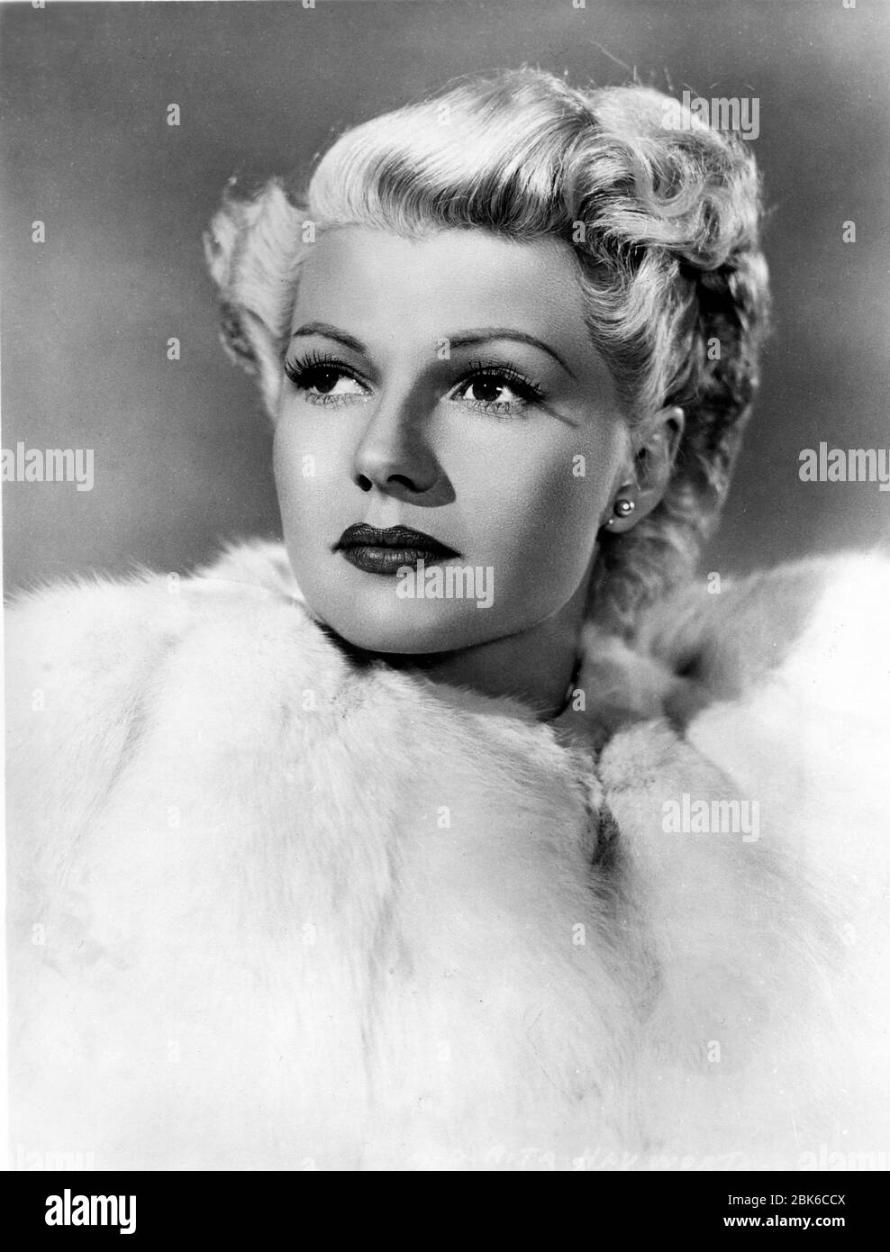 RITA HAYWORTH Portrait as Elsa Bannister in THE LADY FROM SHANGHAI 1947 director / screenplay ORSON WELLES based on novel by Sherwood King gowns Jean Louis Columbia Pictures Stock Photo