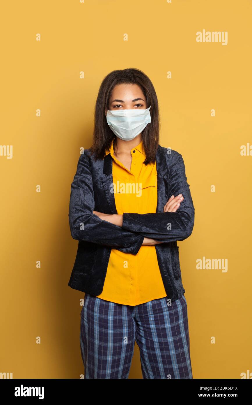 Download Black Woman In A Face Mask On Bright Yellow Background Stock Photo Alamy PSD Mockup Templates