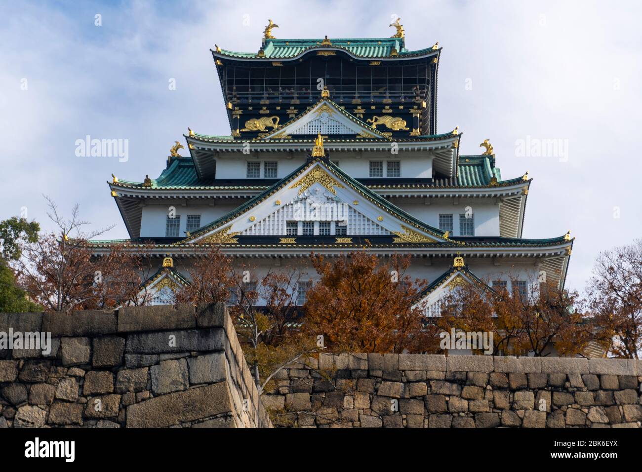 Landscape of Osaka Castle Keep Tower in autumn, Osaka, Japan. Close Up, Low Angle View Stock Photo