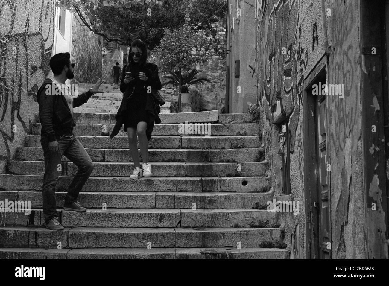 People walking down the stairs, Athens Greece Stock Photo