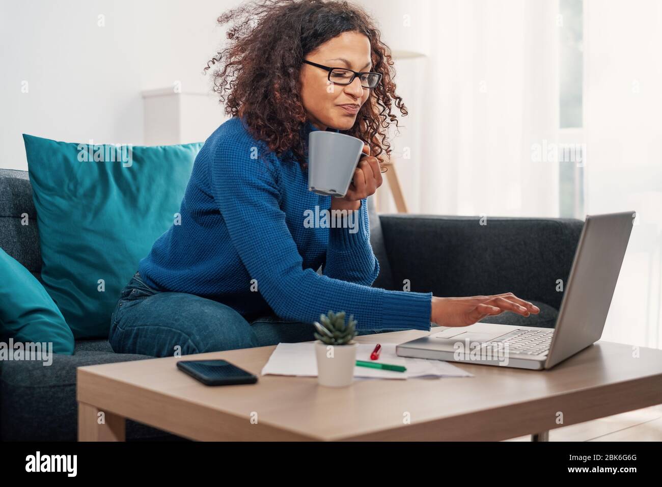 Smart working concept, black woman home office portrait Stock Photo