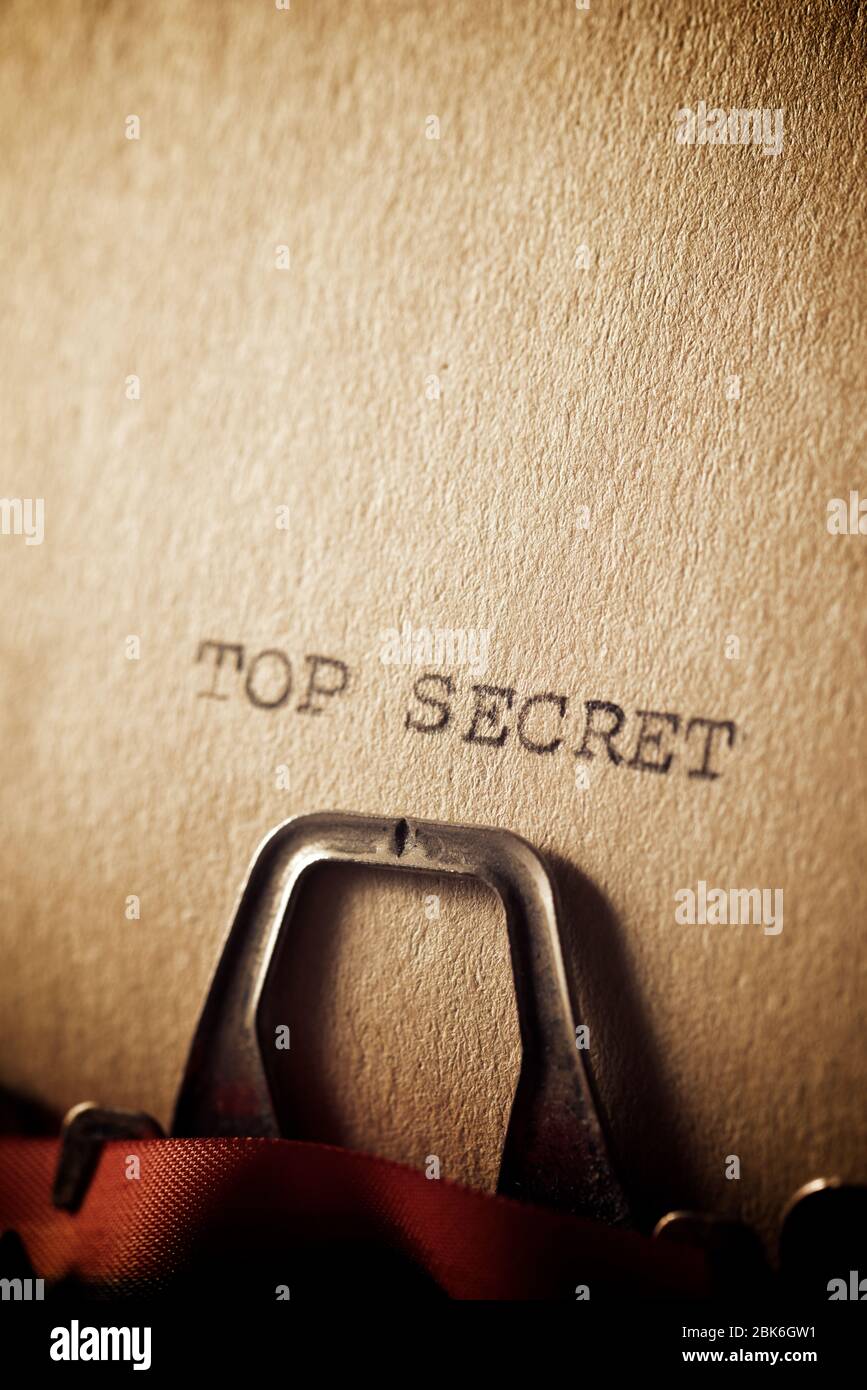 The sentence, Top Secret, written with a typewriter Stock Photo - Alamy