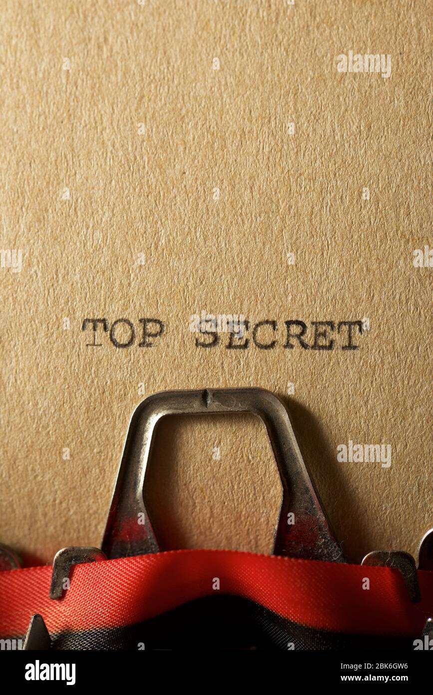 The sentence, Top Secret, written with a typewriter Stock Photo - Alamy