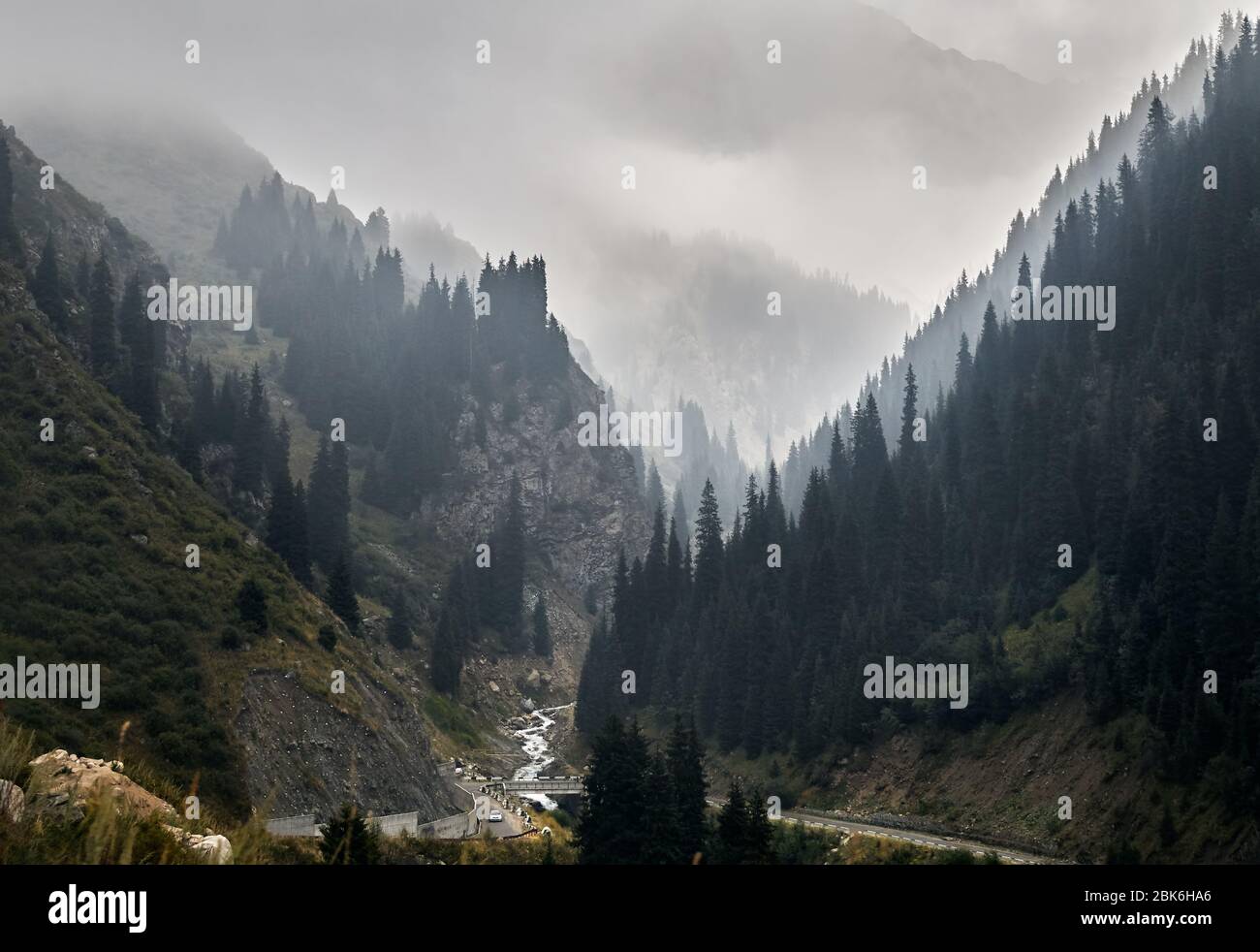 Foggy road to Big Almaty Lake in the mountains of Kazakhstan Stock Photo
