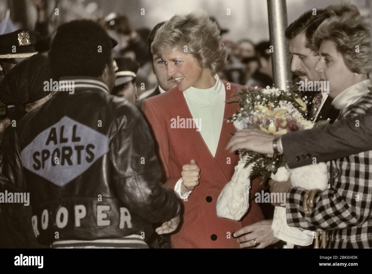 Diana, Princess of Wales in a red jacket surrounded by well wishers visits Harlem  Hospital's pediatric AIDS unit in Harlem. New York City, USA. 1989 Stock  Photo - Alamy