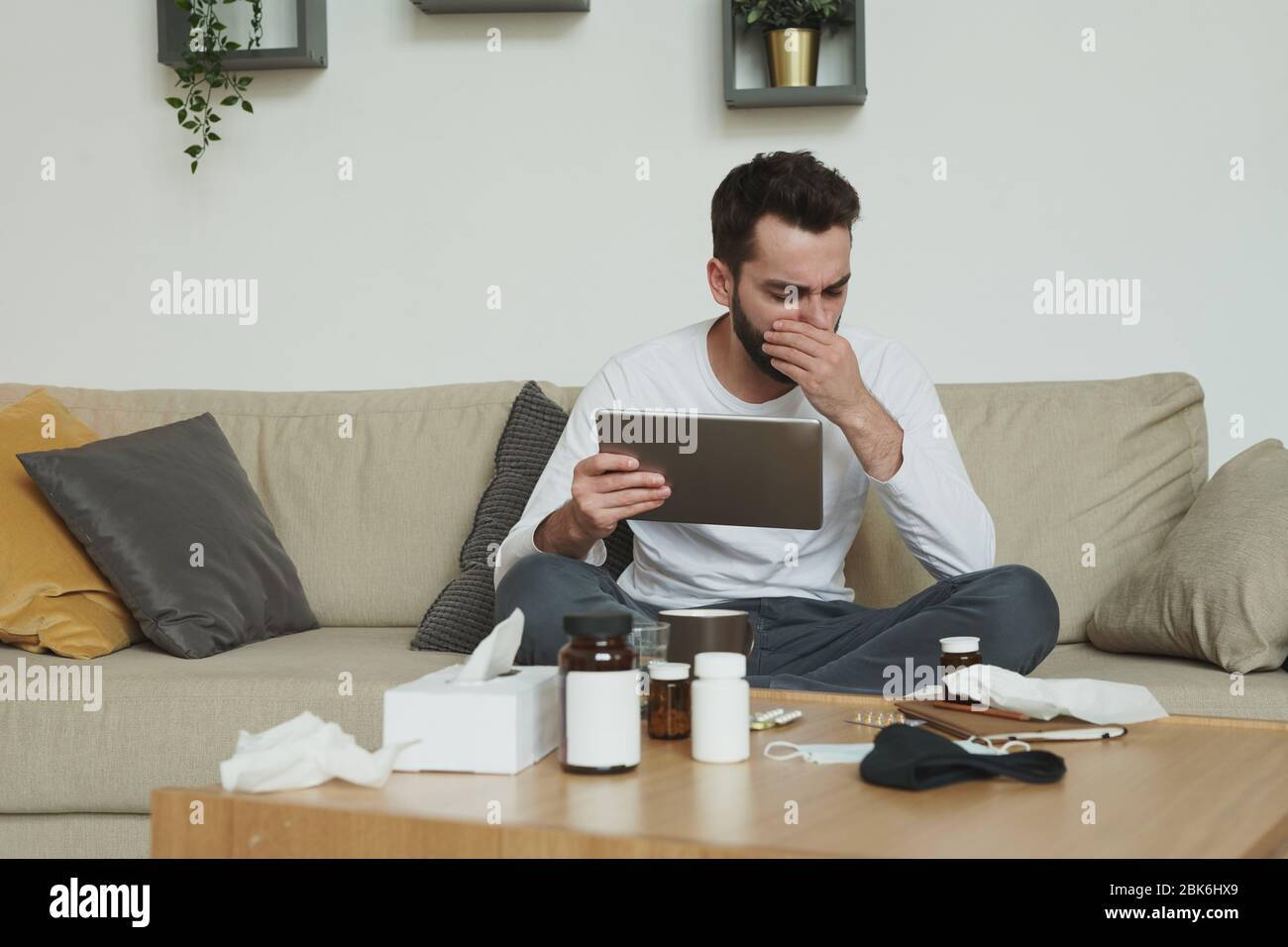 Sick beard man coughing sitting hi-res stock photography and images - Alamy