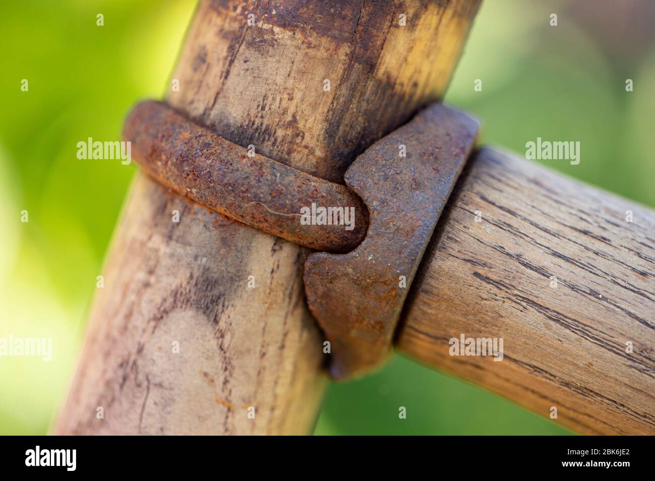 handle on vintage wooden scythe Stock Photo