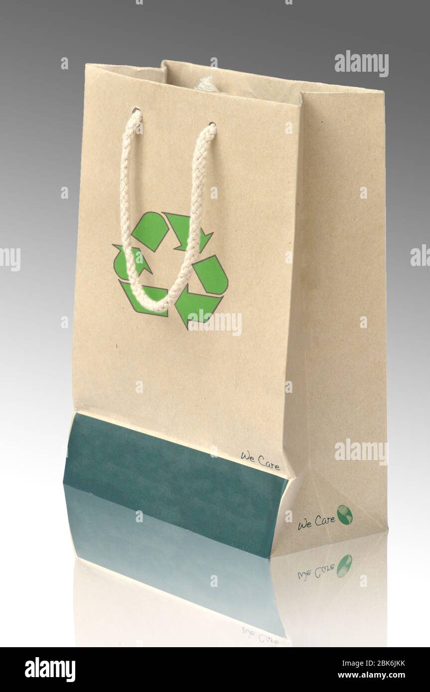 Recycle paper bag with recycle symbol on white background Stock Photo