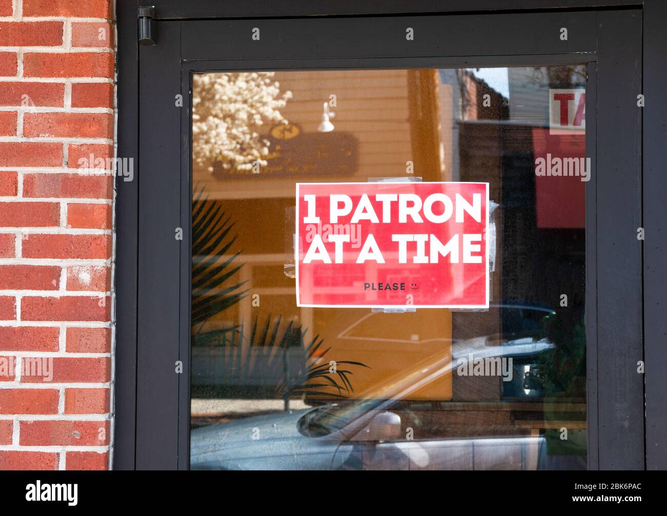 Only 1 customer at a time allowed into a restaurant to pick up their
