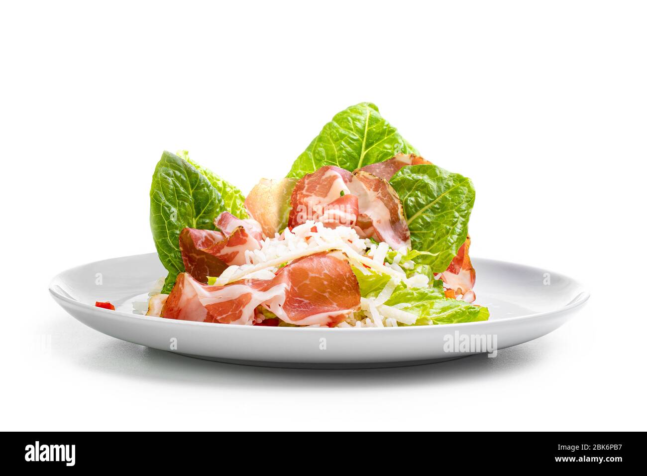 Plate with salad on white background Stock Photo - Alamy