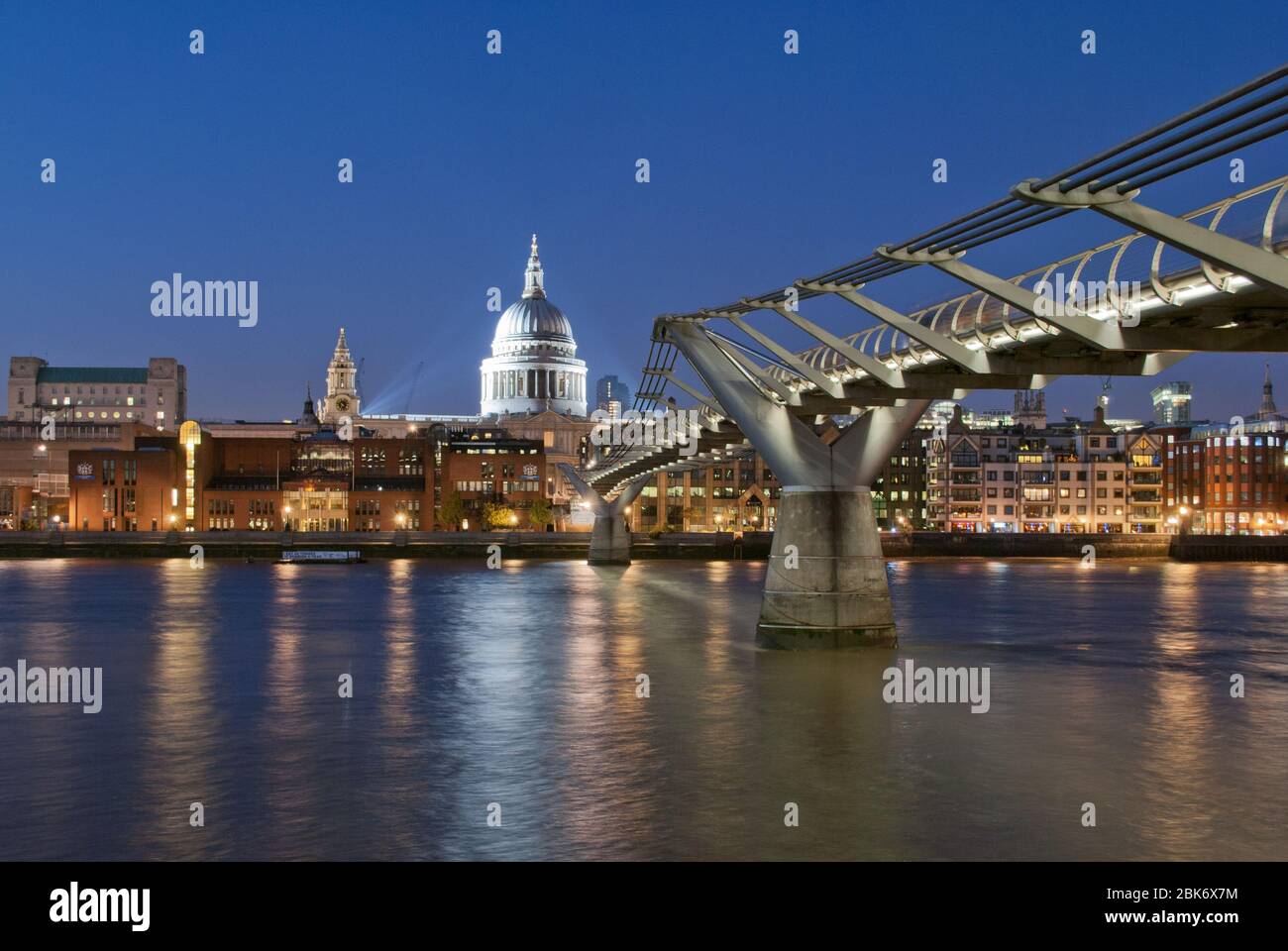 Twilight Dark Night River Thames City of London Skyline Cityscape Icons St. Pauls Cathedral Dome Millennium Bridge Norman Foster Sir Christopher Wren Stock Photo