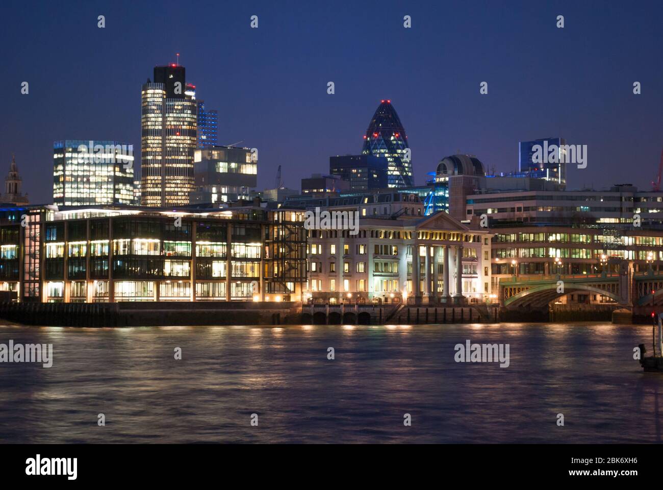 Southwark Bridge Vintners Place Gherkin Natwest Tower Thames Court Building City of London Skyline at Night Dark Twilight Blue Hour Stock Photo