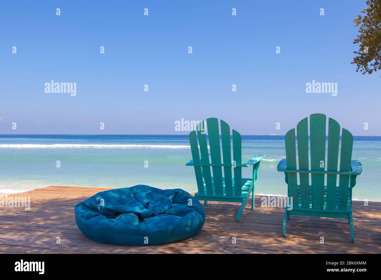 Exotic Sunbeds, Gili Trawangan island, Indonesia. Stock Photo