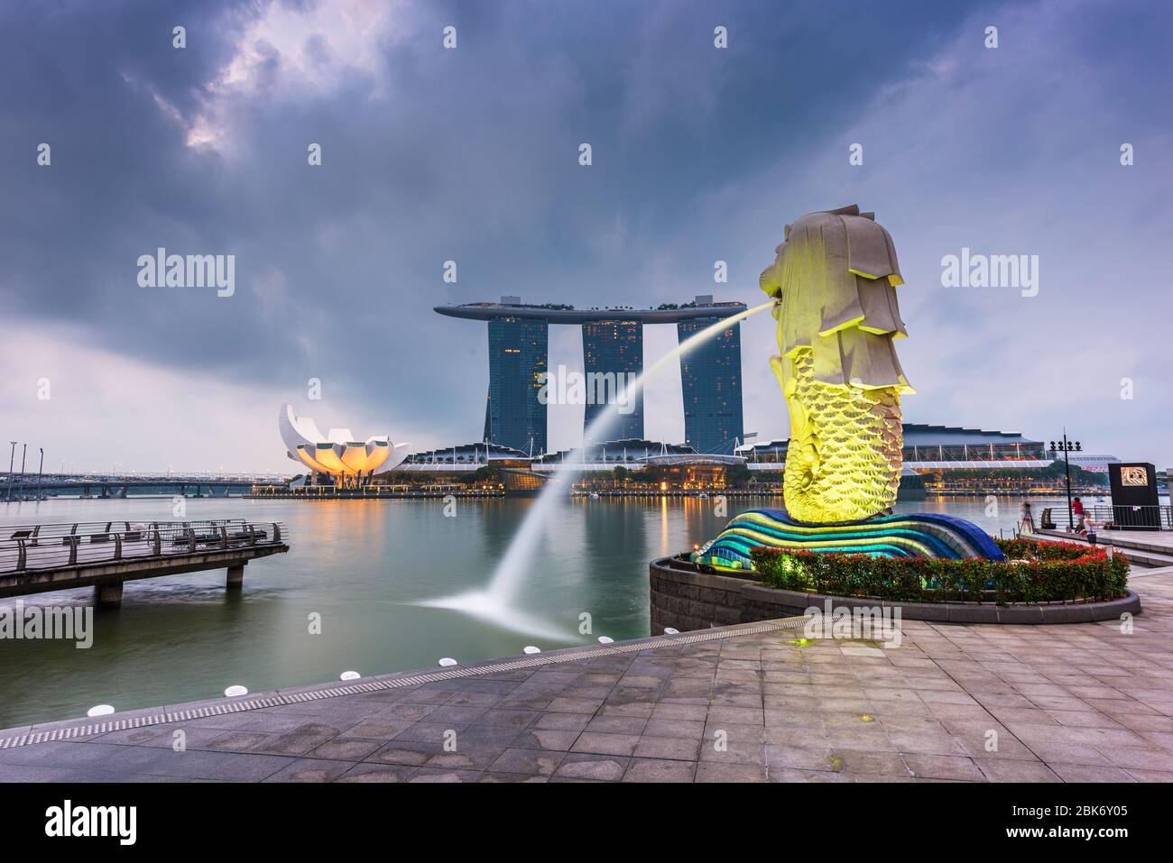 SINGAPORE - SEPTEMBER 6, 2015: The Merlion fountain at Marina Bay. The merlion is a marketing icon used as a mascot and national personification of Si Stock Photo