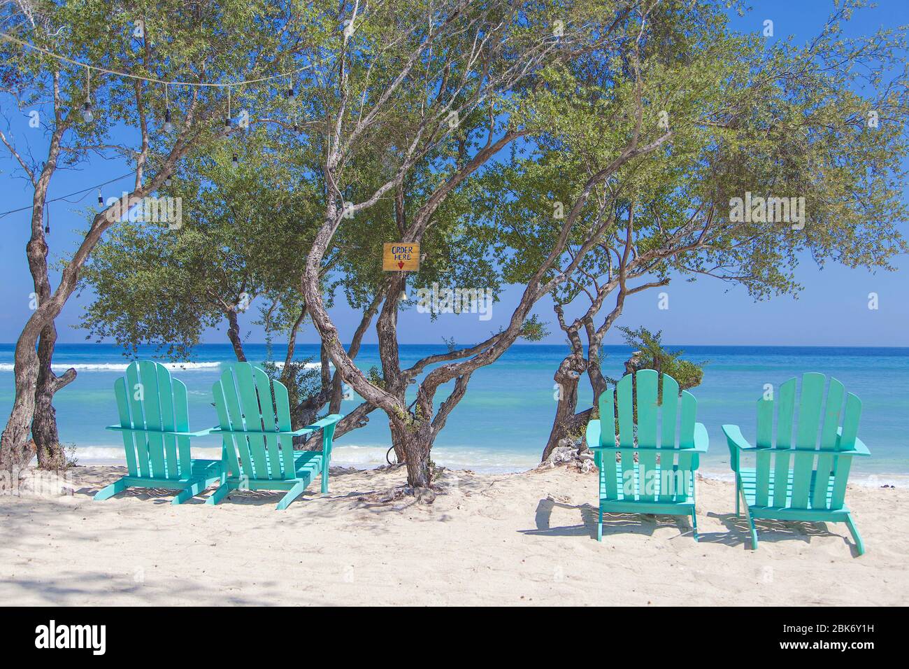 Exotic Sunbeds, Gili Trawangan island, Indonesia. Stock Photo