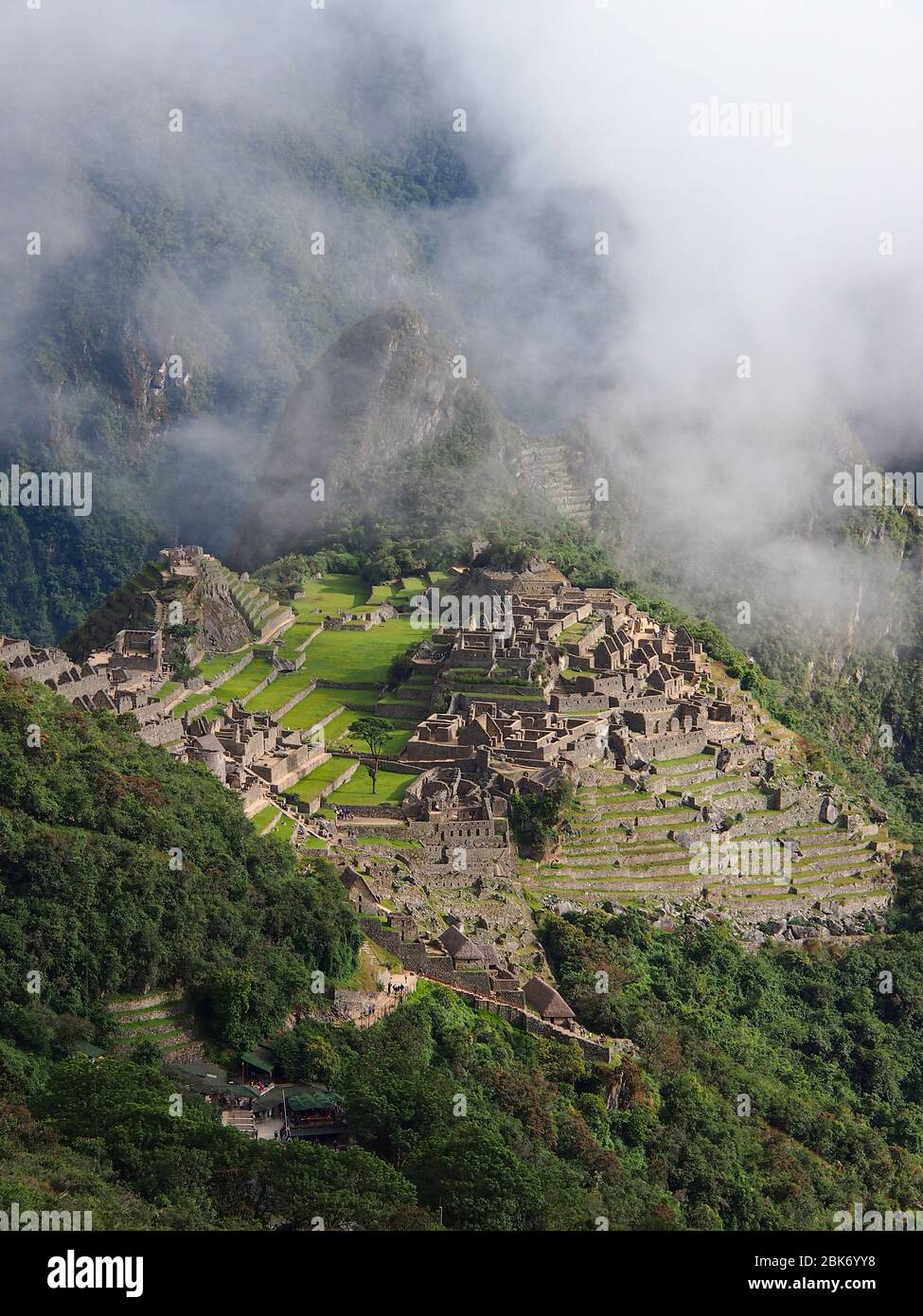Overview of Machu Picchu with clouds, Peru Stock Photo - Alamy