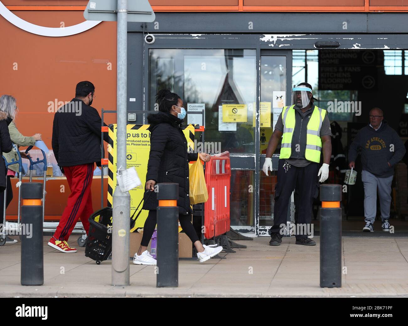 Customers entering the B&Q Greenwich store, London Stock Photo Alamy