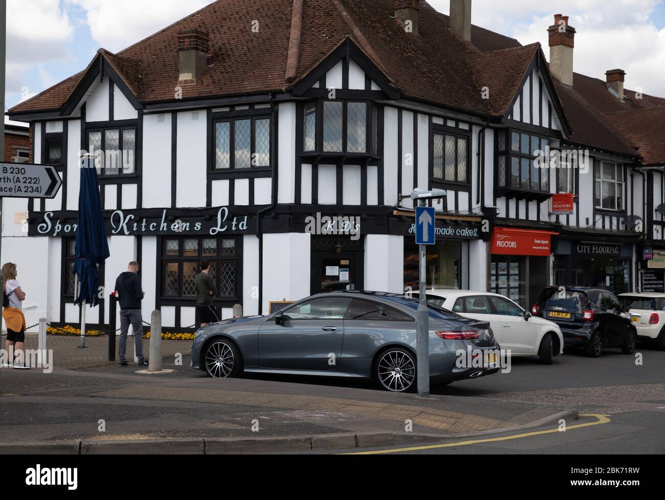 Beckenham,Kent,UK,2nd May 2020,During lockdown people still maintain social distancing of 2 Metres as streets and parks seem strangely quiet. Sponge Kitchens Bakery is open to customers.Credit:Keith Larby/Alamy Live News Stock Photo