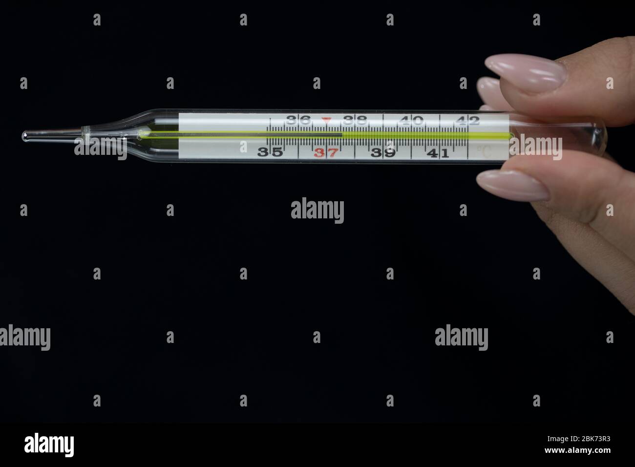 Gun electronic medical thermometer measuring Handheld Forehead Readings  diagnostic display shows the result of the body temperature measurement  36.6 C Stock Photo - Alamy