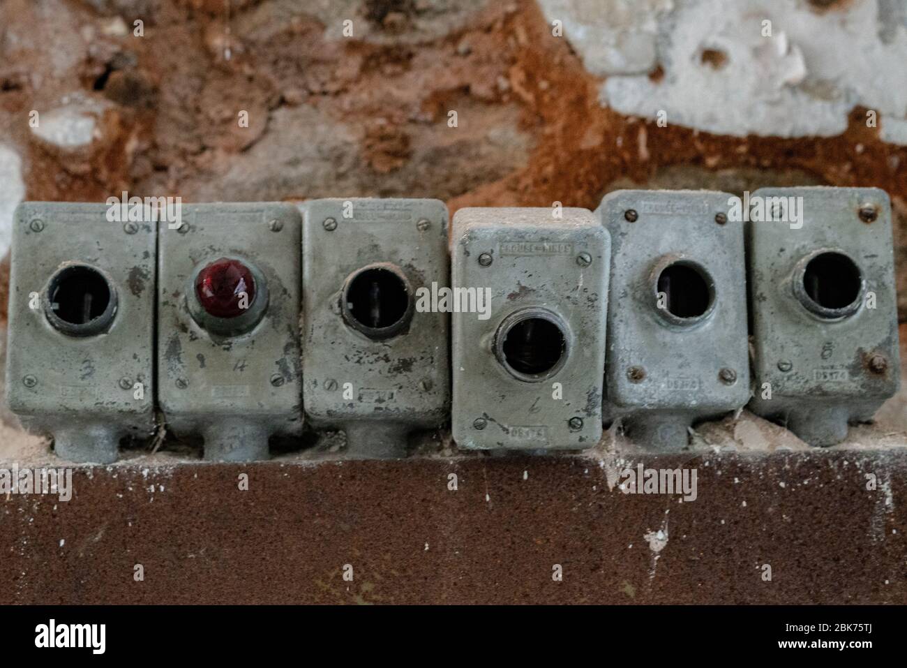 Old power buttons at Eastern State Penitentiary in Philadelphia, Pennsylvania, which is a former prison that functioned from 1829 to 1971. Stock Photo