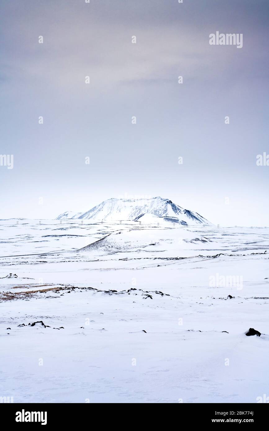 Contra jour snow covered mountain wilderness, north east Iceland in winter. Near Lake Myvatn Stock Photo