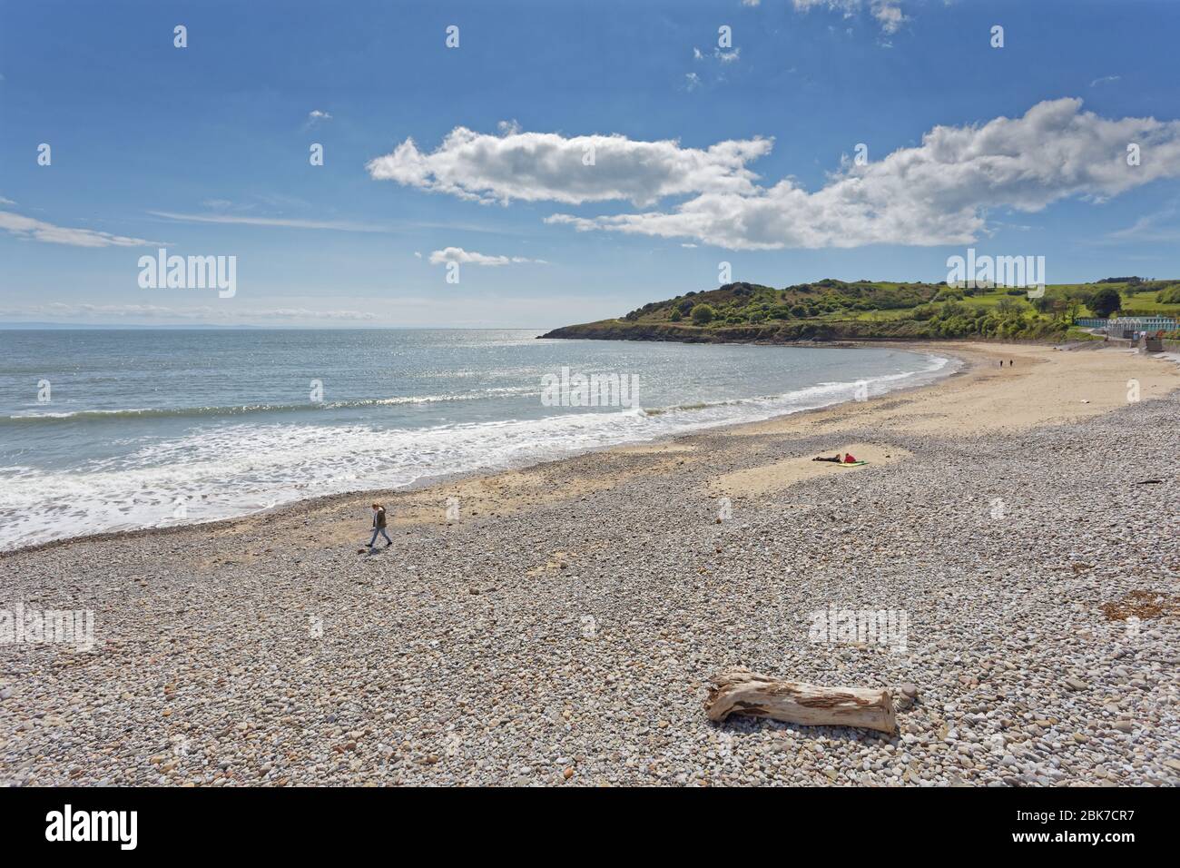 The almost deserted beach in Langland Bay Stock Photo