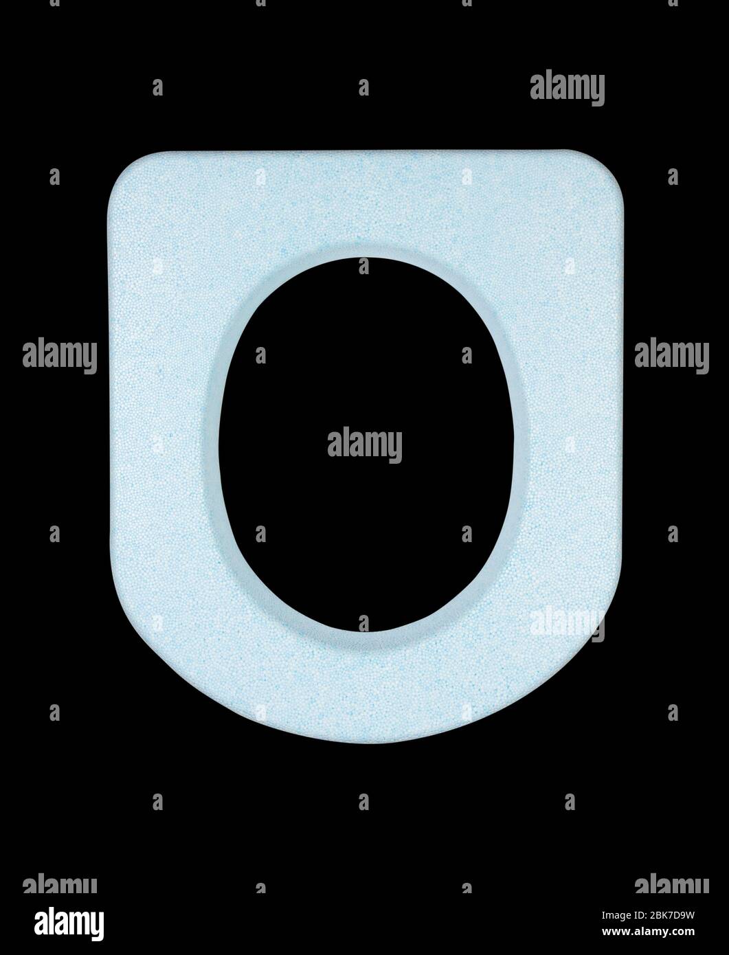 blue toilet seat made of polystyrene foam isolated on a black background top view Stock Photo