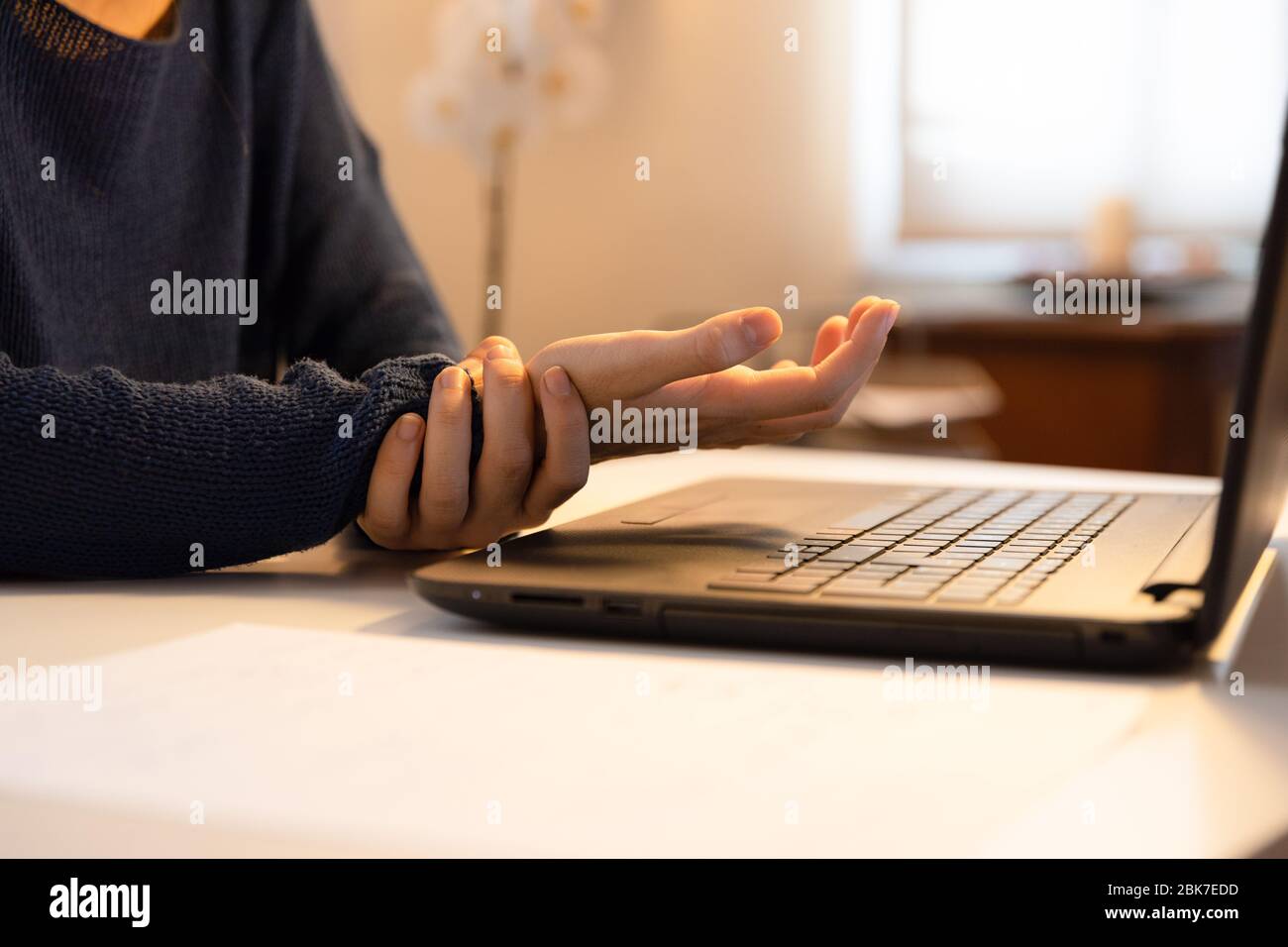 Woman hands with injured wrist complaining Stock Photo