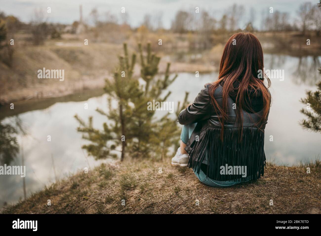 Sad girl water lake hi-res stock photography and images - Alamy