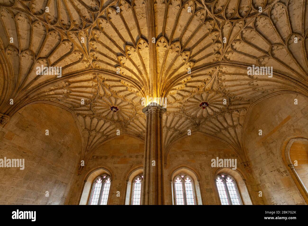 The decorated vaulted ceiling, columns and arched windows in Christ Church college at Oxford University, England Stock Photo