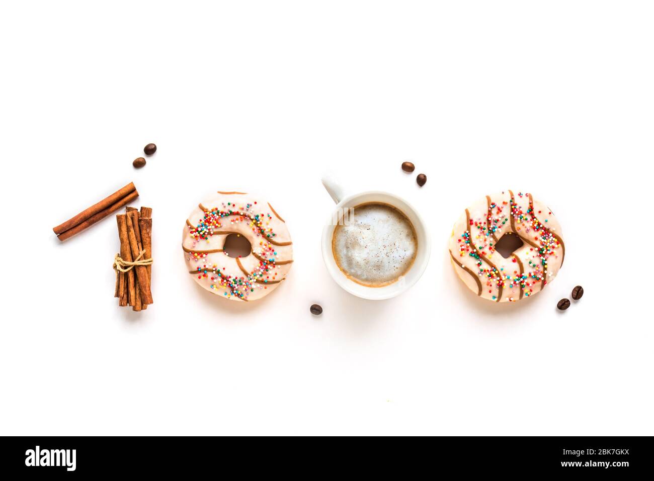 Coffee and donuts in 1000 sign. 1k likes, comments or followers, 1000 subscribers on social media, celebration achievement, creative flat lay on white Stock Photo