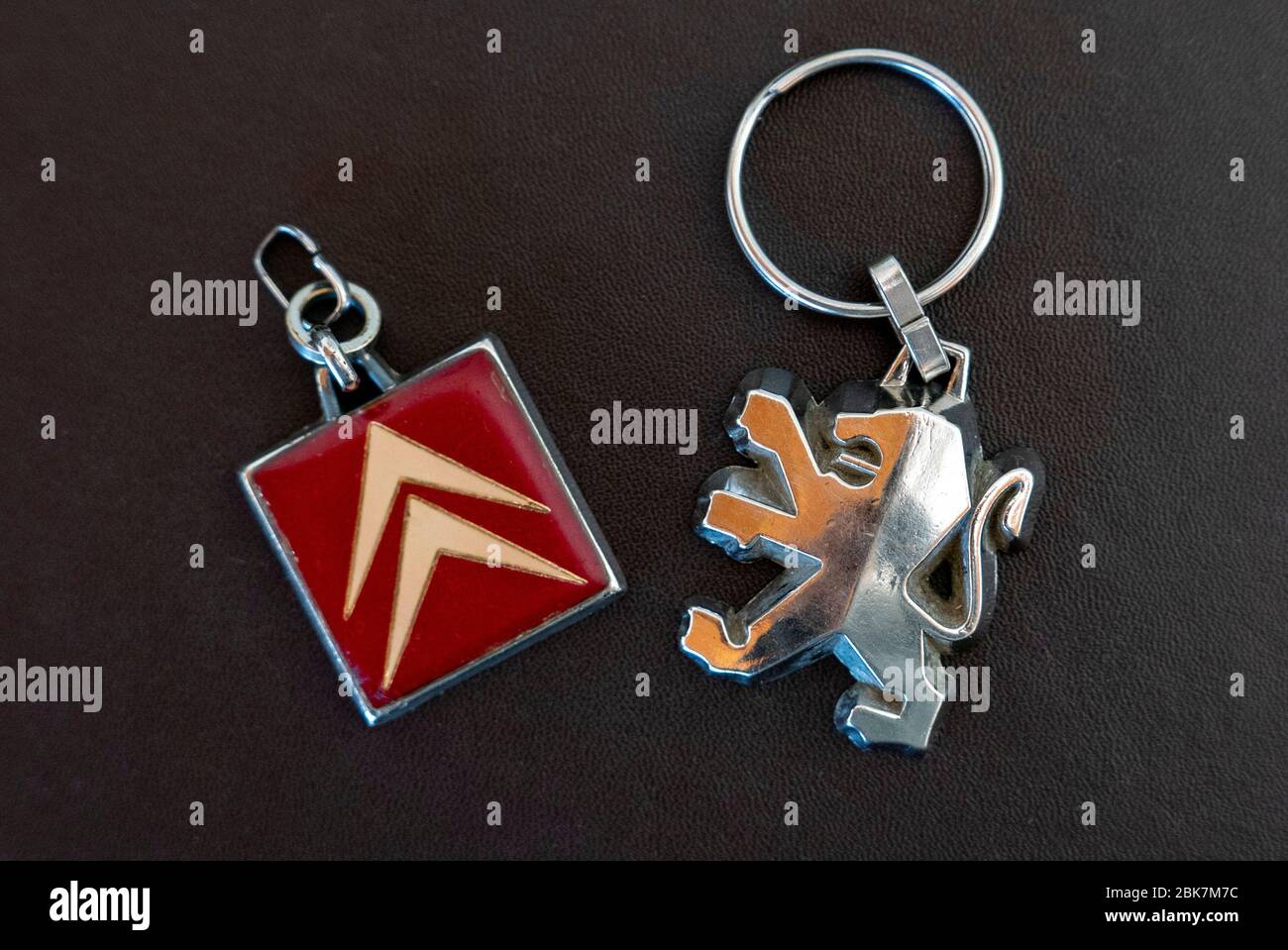 Citroen and Peugeot car keychains Stock Photo