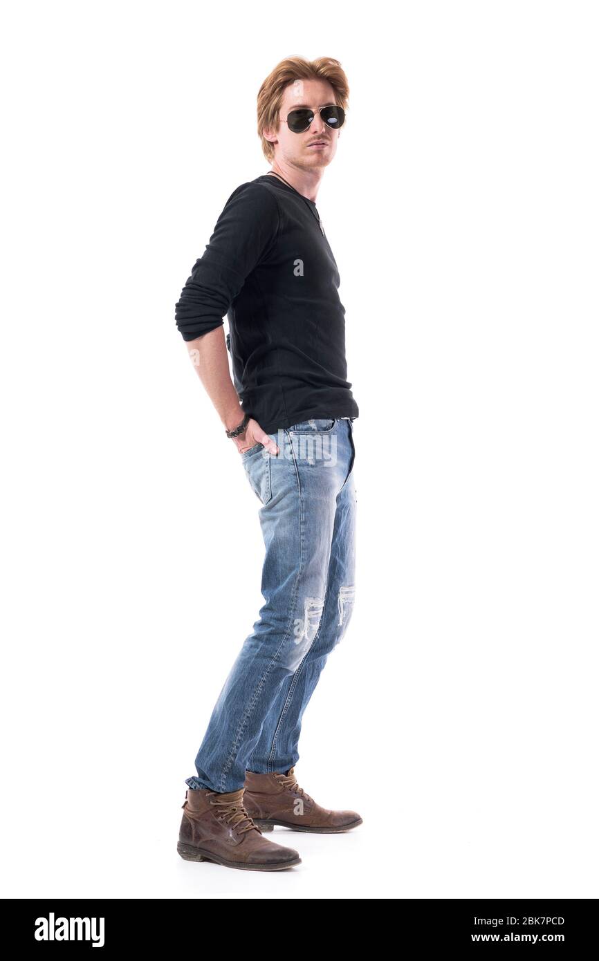 Cool macho ginger hair man in jeans and 