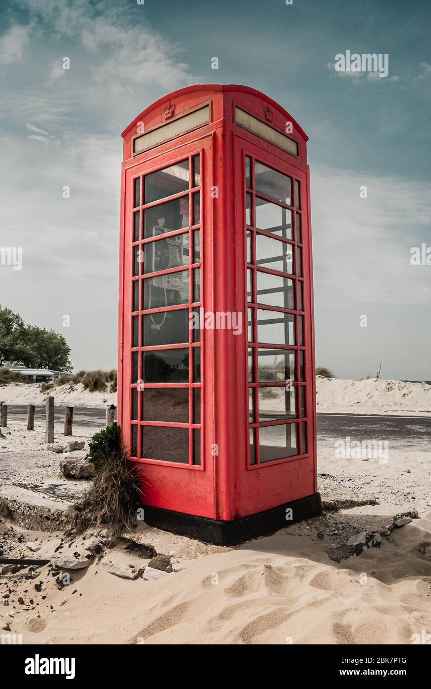 Red old telephone booth at roadside hi-res stock photography and images ...