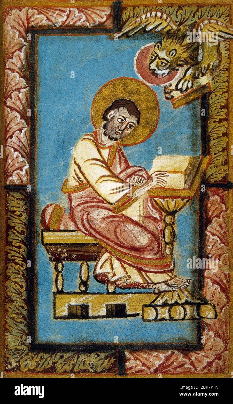 Saint Mark the Evangelist writing the second Gospel, accompanied by the winged lion (symbol of the tetramorph). Miniature, 11th century. Conde Museum, Chateau of Chantilly. France. Stock Photo