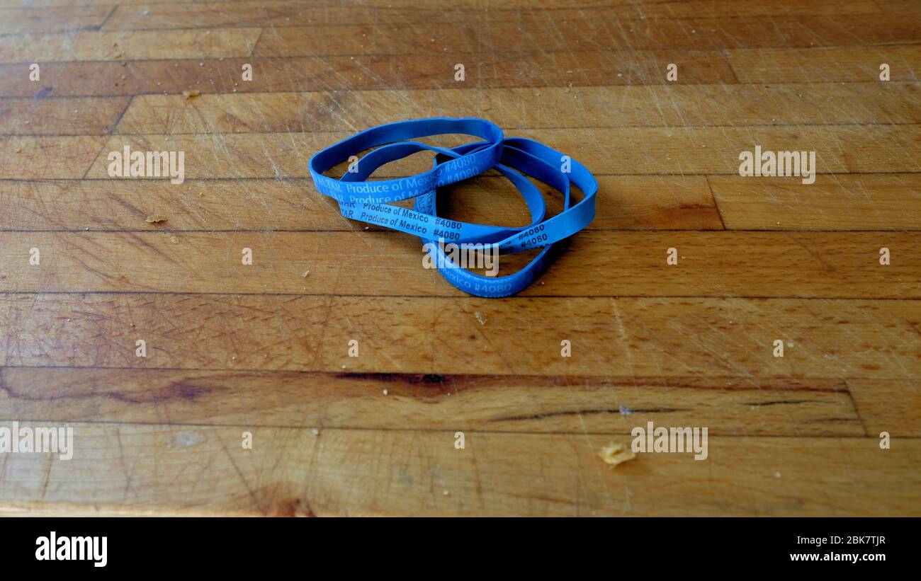 Rubber bands imprinted with Price Look-Up code #4080 and Produce of ...