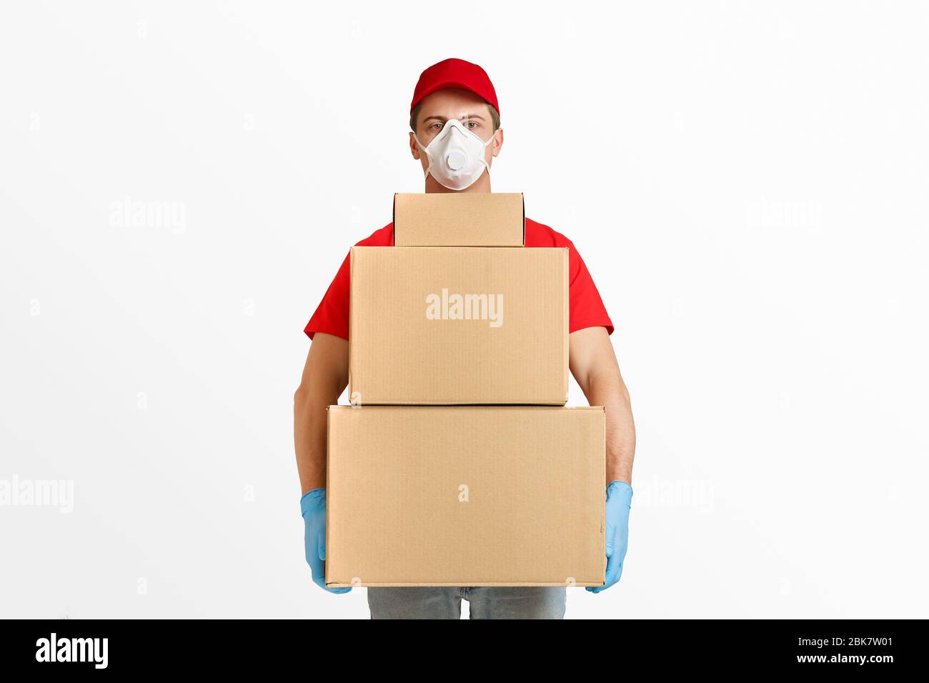 Modern post. Courier quickly delivers many packages Stock Photo Alamy