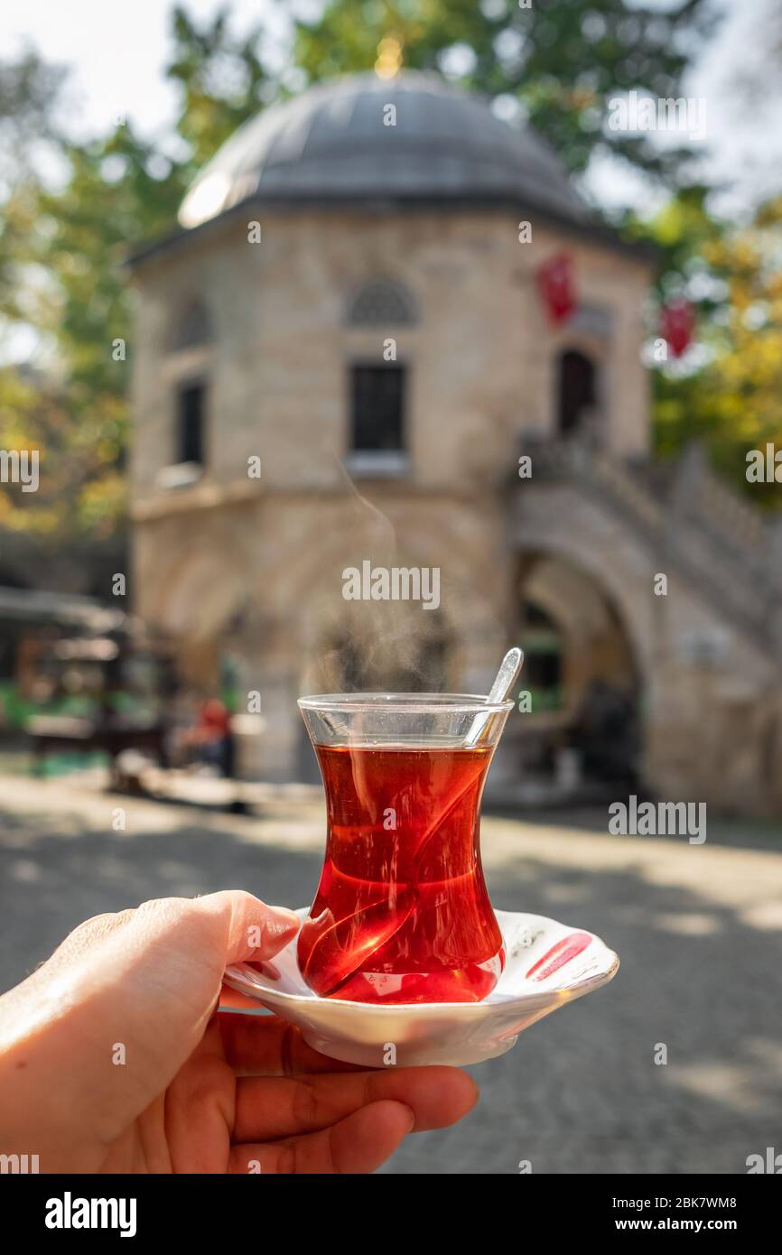 Turkish tea in a traditional turkish garden in Koza Han Silk Bazaar in Bursa, Turkey Stock Photo