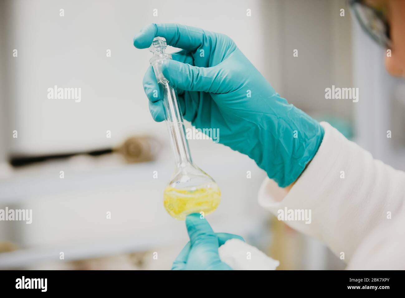 Equipment and science experiments oil pouring scientist, chemist with