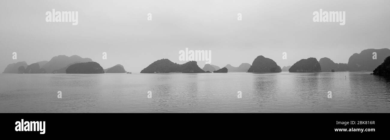 Sailing though Ha Long bay Stock Photo