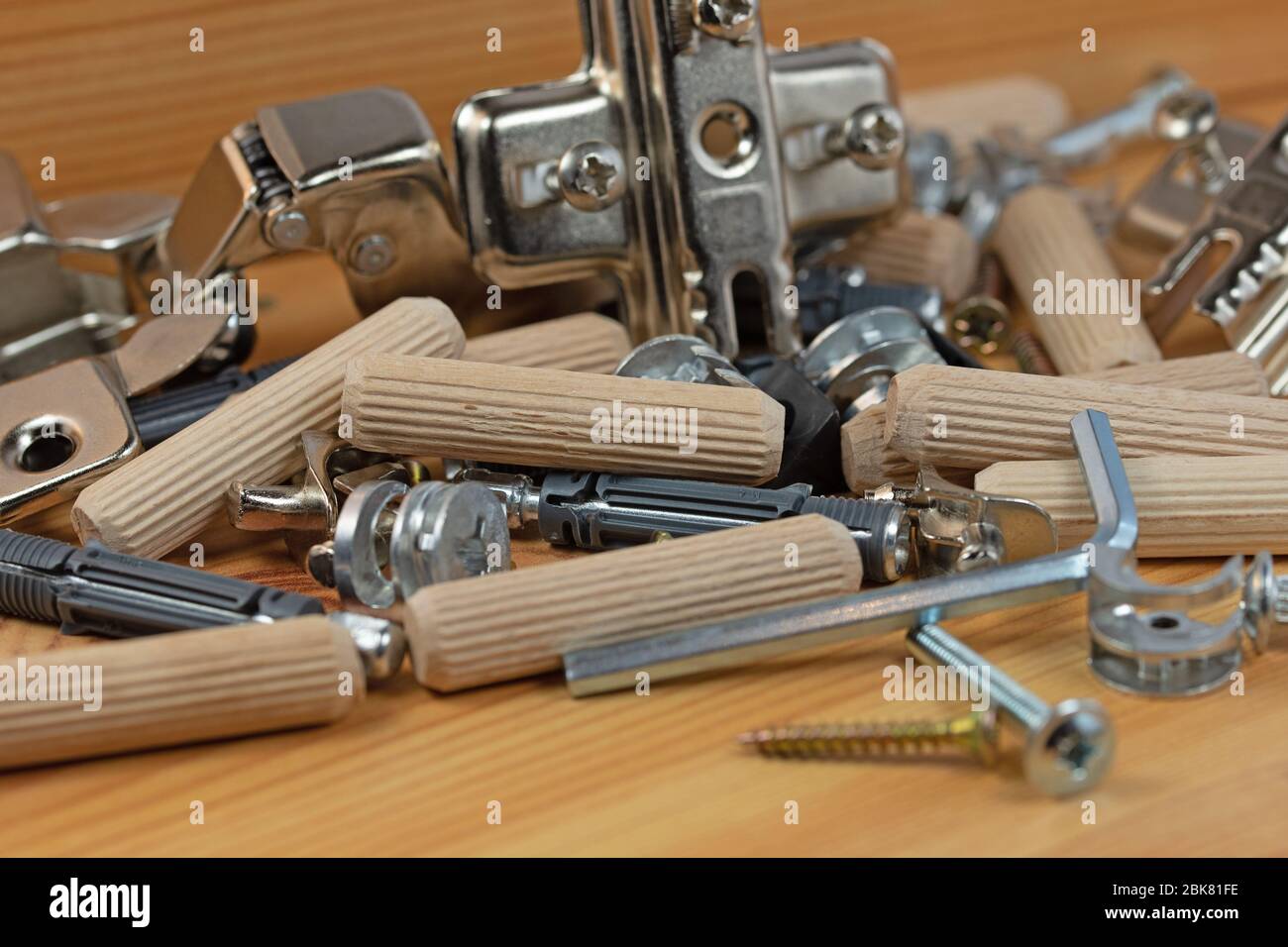 Various furniture fittings and assembly utensils in a closeup Stock
