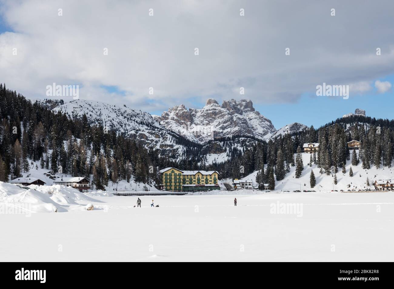 Frozen Misurina Lake and Dolomites mountains in the background  Misurina, Dolomites, Veneto, Italy Stock Photo
