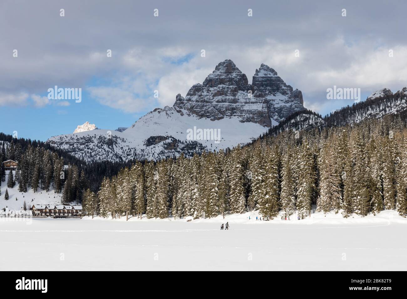 Frozen Misurina Lake and Tre Cime di Lavaredo in the background  Misurina, Dolomites, Veneto, Italy Stock Photo